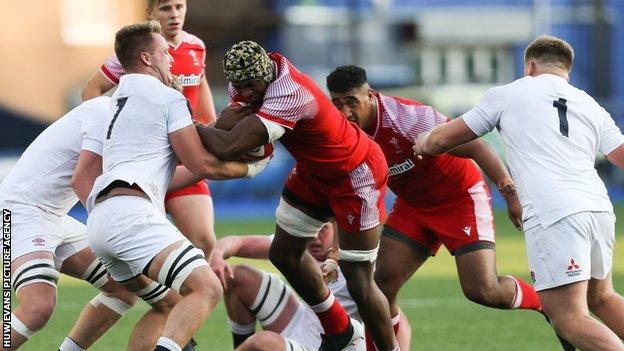 Christ Tshiunza in action for Wales Under-20s against England in the 2021 Six Nations