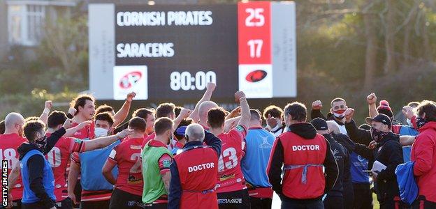 Cornish Pirates celebrate their win over Saracens