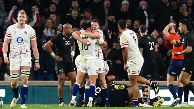 Owen Farrell celebrates Will Stuart's try against New Zealand