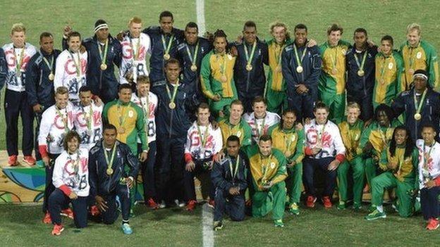 After the medal ceremony players from champions Fiji, silver medallists Great Britain and bronze medallists South Africa mingled for a group photo