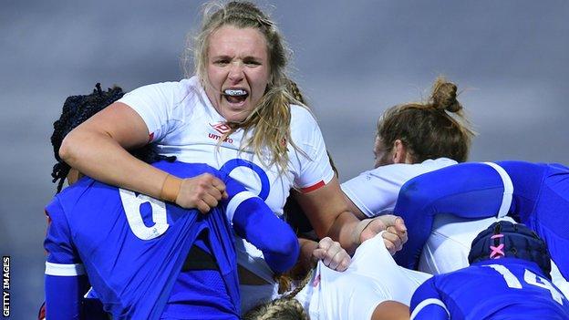 Zoe Aldcroft playing against France