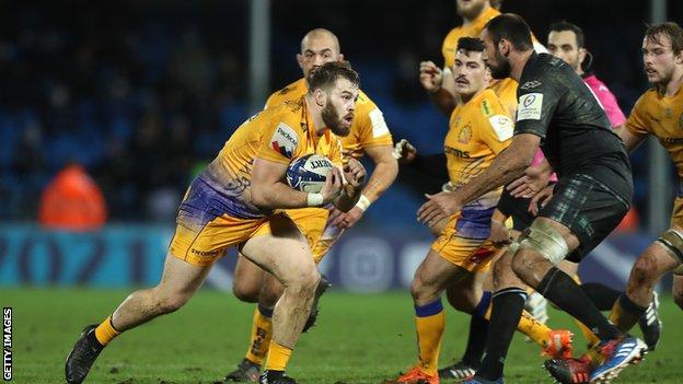 Exeter's Luke Cowan-Dickie runs with the ball