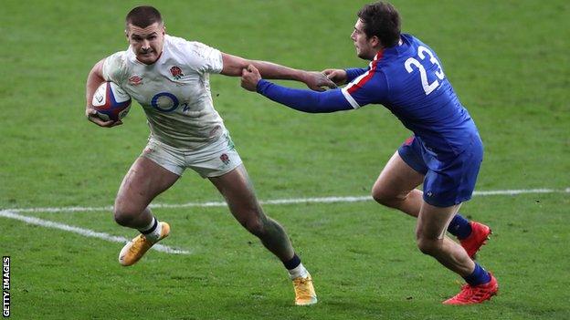 Henry Slade evades a tackle