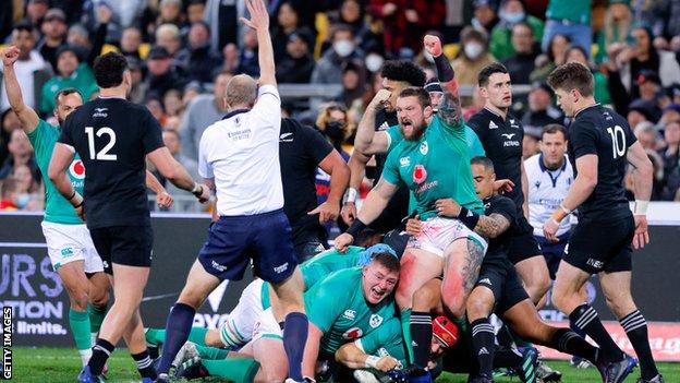 Andrew Porter celebrates Ireland's opening try