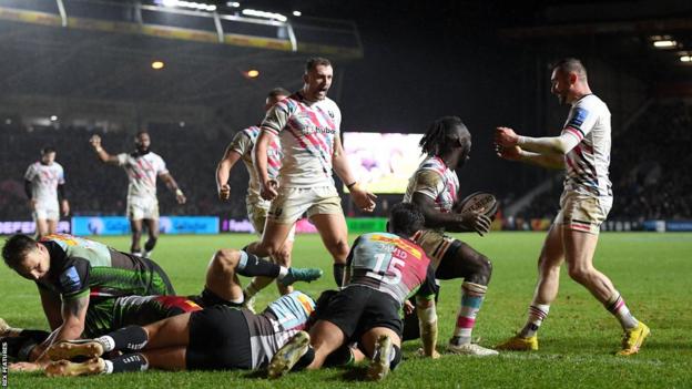 Bristol celebrate scoring a try against Harlequins