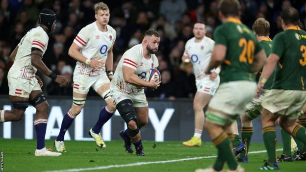 Will Stuart carries the ball for England against South Africa