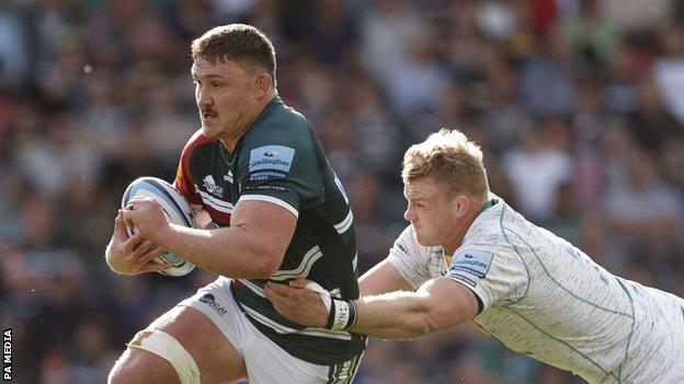 Leicester Tigers' Jasper Wiese tries to break out of a tackle