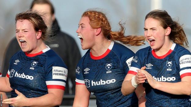 Delaney Burns celebrating with Bristol team-mates