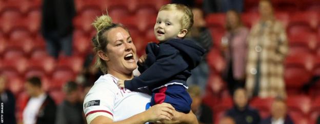 Marlie Packer with son Oliver after playing for England